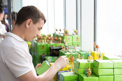 Portrait of man working on table