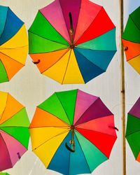 Directly below shot of colorful umbrellas hanging