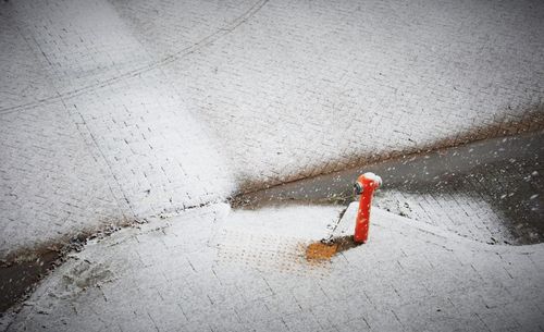 High angle view of puddle on street