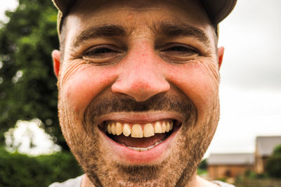 Close-up portrait of smiling man