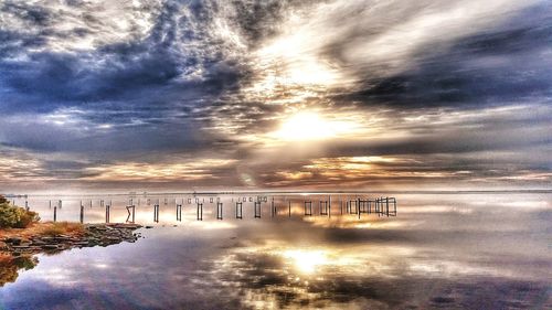 Scenic view of sunset over river