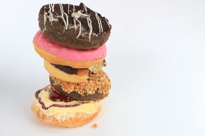 Close-up of cake against white background