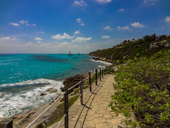 Scenic view of sea against cloudy sky