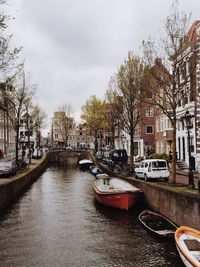 Boats moored in canal