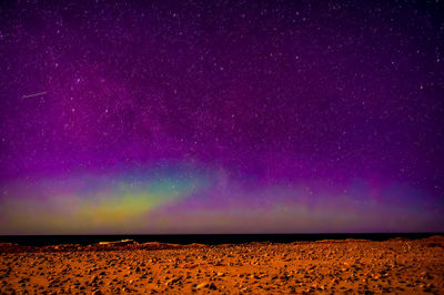 Scenic view of star field against sky at night