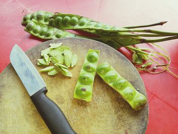 High angle view of vegetables on cutting board