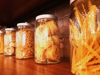 Close-up of glass jar on table