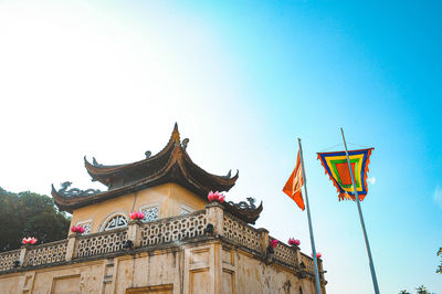 Low angle view of traditional building against clear sky