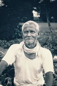 Portrait of man standing outdoors