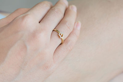 Close-up of woman holding hands