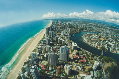 High angle view of city buildings against sky