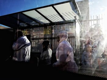 People sitting in front of building