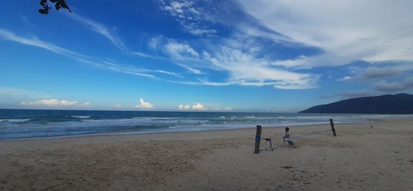 Scenic view of beach against sky