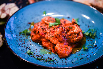 High angle view of meat in plate on table