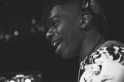 Portrait of smiling young man looking away