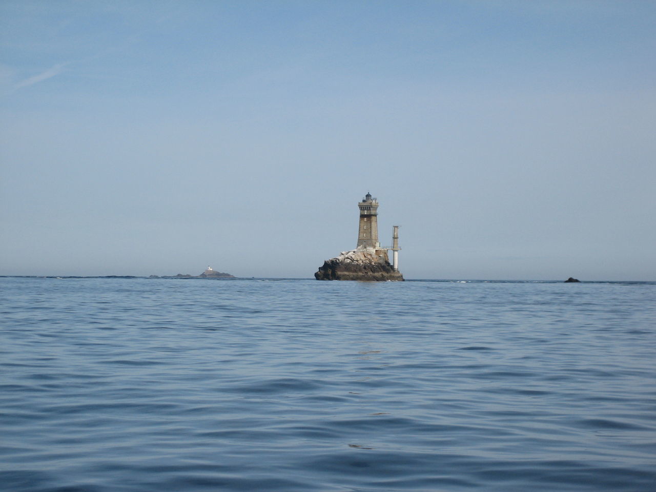 VIEW OF LIGHTHOUSE SAILING ON SEA AGAINST SKY