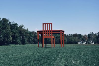 Built structure on field against clear sky