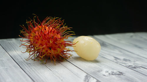 Close-up of orange fruit on table