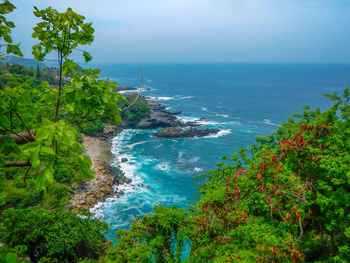 High angle view of bay against clear sky