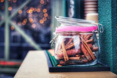 Close-up of food in jar on table