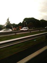 Car on road against clear sky