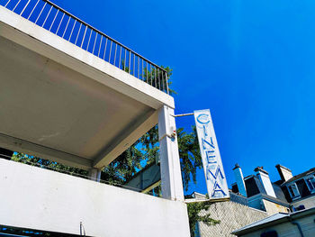 Low angle view of building against clear blue sky