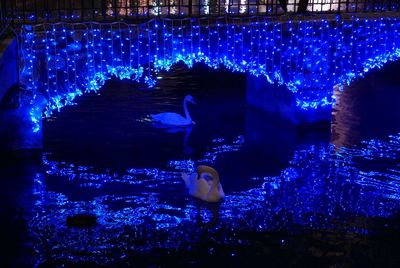View of illuminated buildings at night
