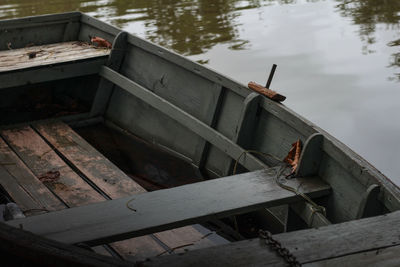 High angle view of abandoned boat against lake