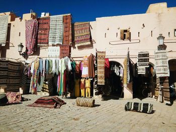 Clothes drying against built structures