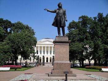 Statue in front of museum building