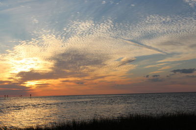 Scenic view of sea at sunset