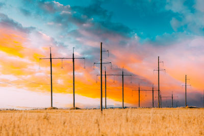 Scenic view of field against sky during sunset