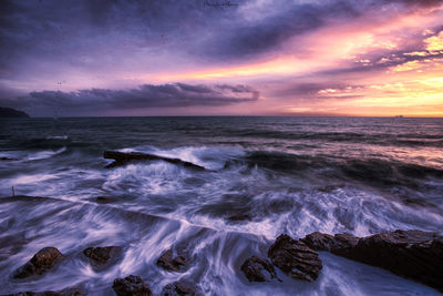 Scenic view of sea against sky during sunset