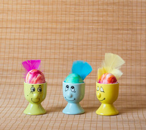 Close-up of easter eggs on wooden table