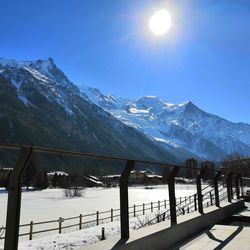 Scenic view of snowcapped mountains against sky