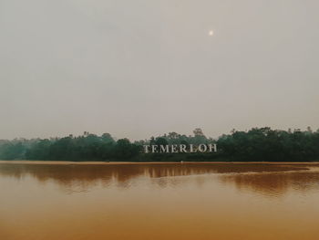 Scenic view of lake against clear sky