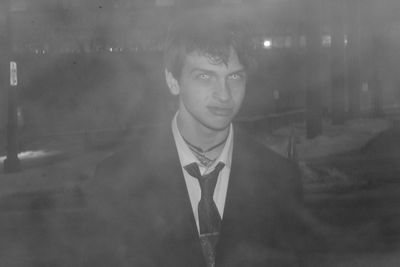 Portrait of young man looking at camera