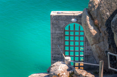 View of rock in sea