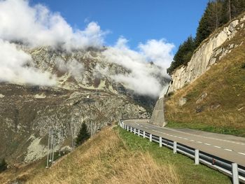 Scenic view of mountain road against sky