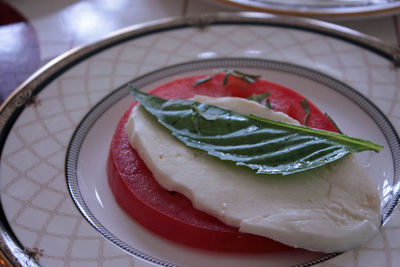 Close-up of caprese salad served in plate