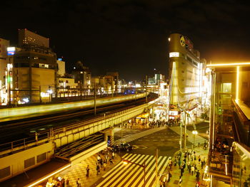 High angle view of light trails on road in city