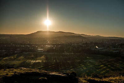 Scenic view of mountains against sky during sunset