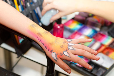 Close-up of woman hand with tattoo