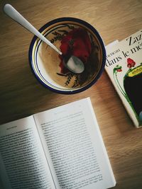 High angle view of open book on table