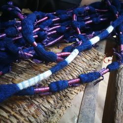 High angle view of ropes tied on wood