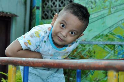 Portrait of cute boy looking at camera