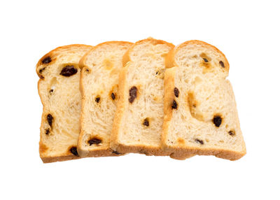 Close-up of bread against white background