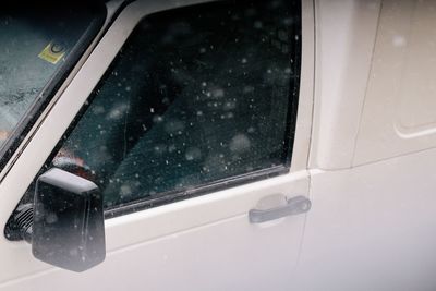 Close-up of wet car window