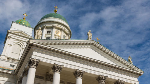 Low angle view of statue against sky