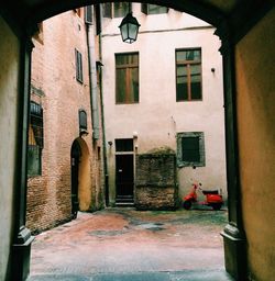 Alley amidst buildings in city